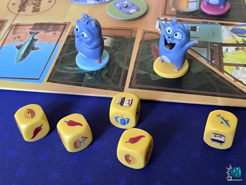 Alors je prend quel dé ? Un piment ? Non un poisson ? Ah non les frites !